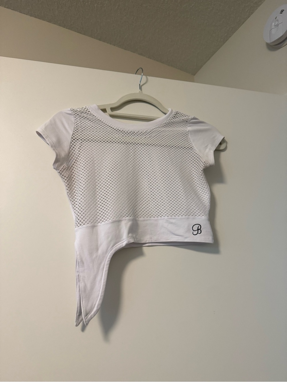 Bombshell Sportswear White Mesh Asymmetric Crop Top